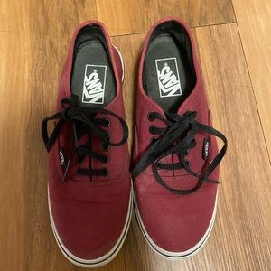 Burgundy vans with black laces